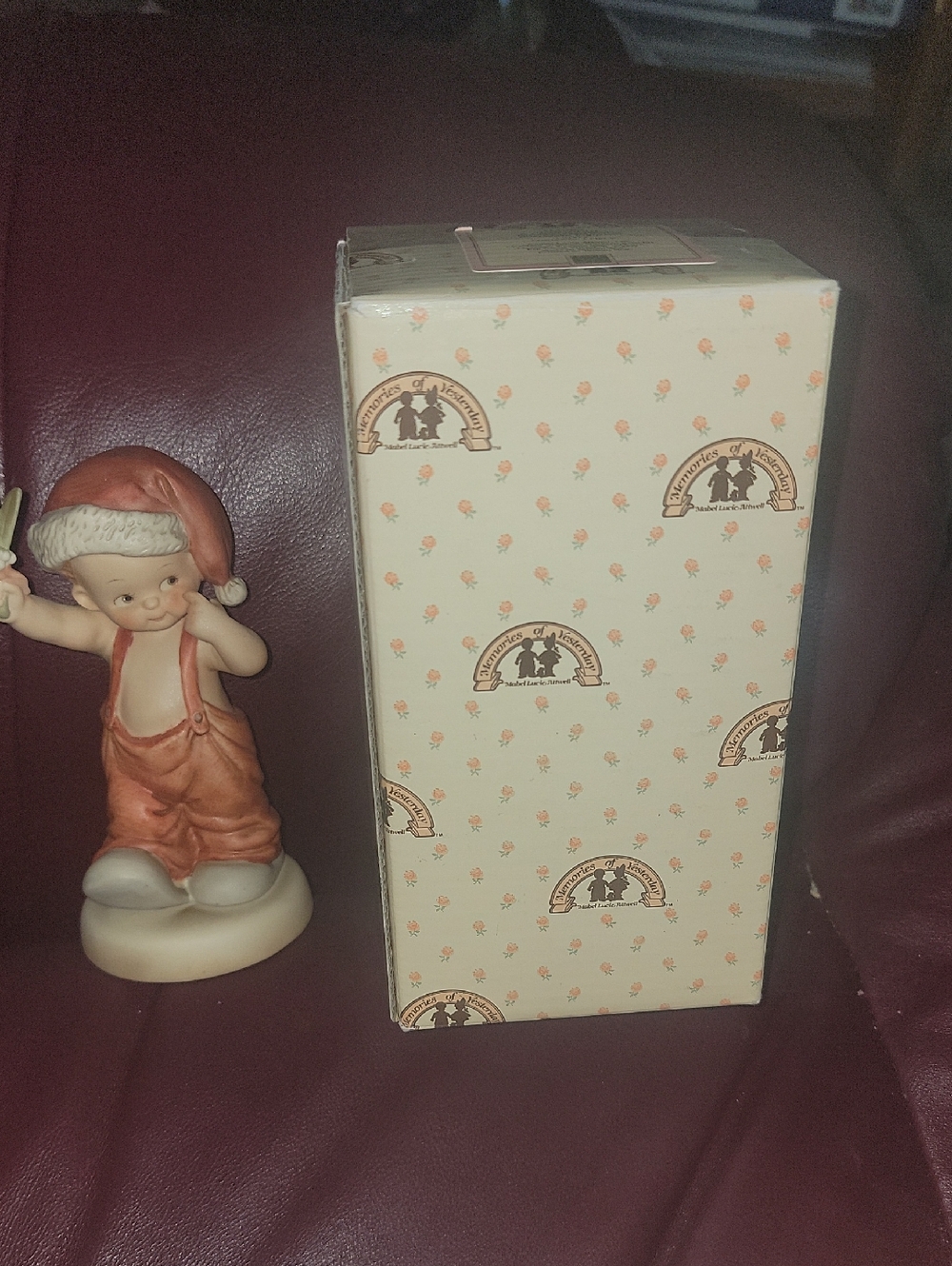 Christmas. Boy With Mistletoe Porcelain Pixie Figurine in Peach Overalls